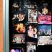 The corners of party photos curl as they hang in an enclsoure outside of the former Dream Nite Club on Monday morning.  Melanie Maxwell I AnnArbor.com